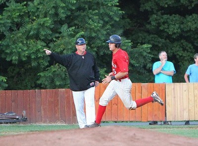 Keith Skinner (Fairfield) rounds third as John Nogowski flies out to right